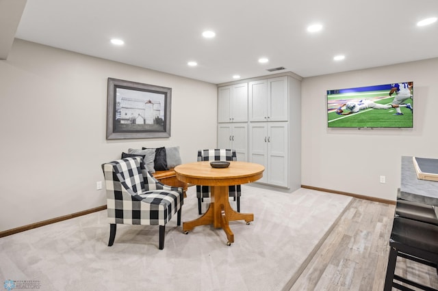 dining area featuring light wood-type flooring