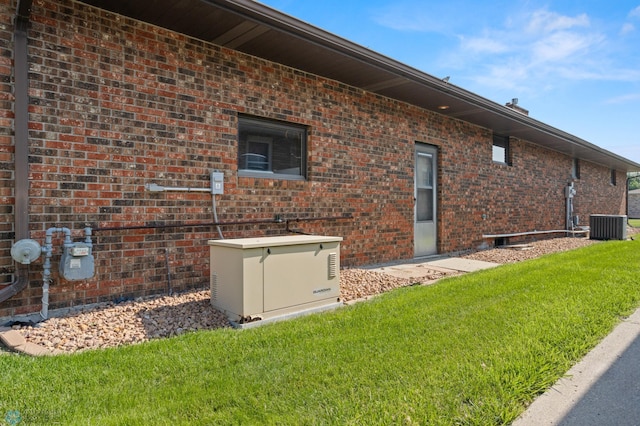 view of home's exterior featuring a yard