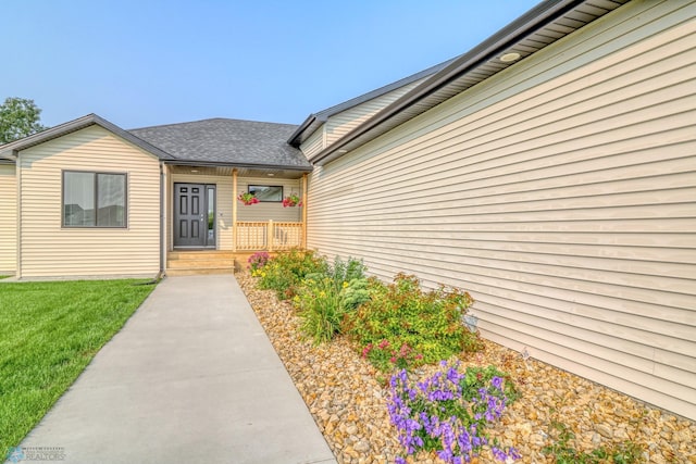 entrance to property with covered porch