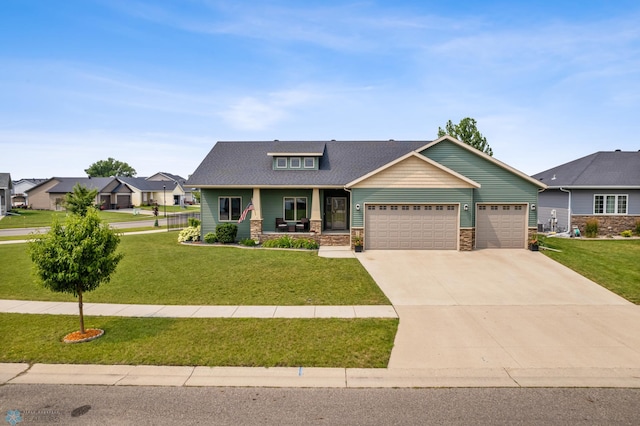 craftsman-style home featuring a garage, a porch, and a front lawn