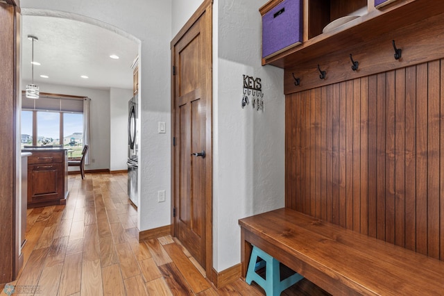 mudroom with light wood-type flooring