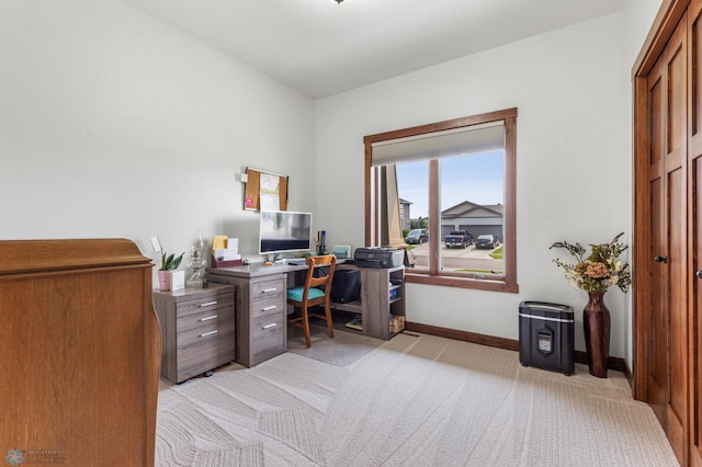 home office with light carpet