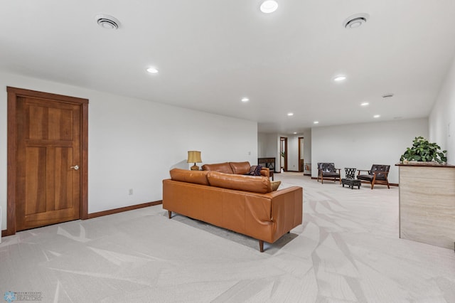 living room featuring light colored carpet