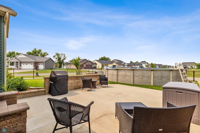 view of patio with a grill