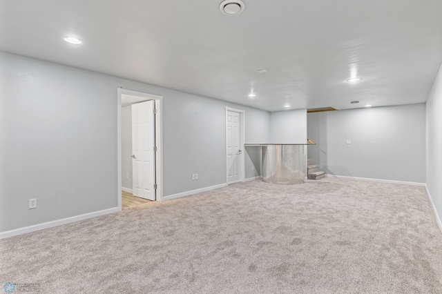 basement with light colored carpet