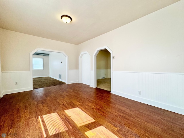 spare room featuring hardwood / wood-style flooring