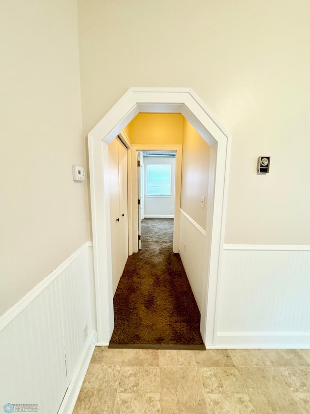 corridor featuring tile patterned floors