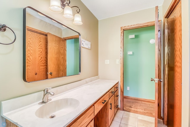 bathroom with vanity and hardwood / wood-style floors