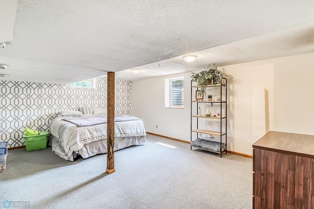 carpeted bedroom with a textured ceiling