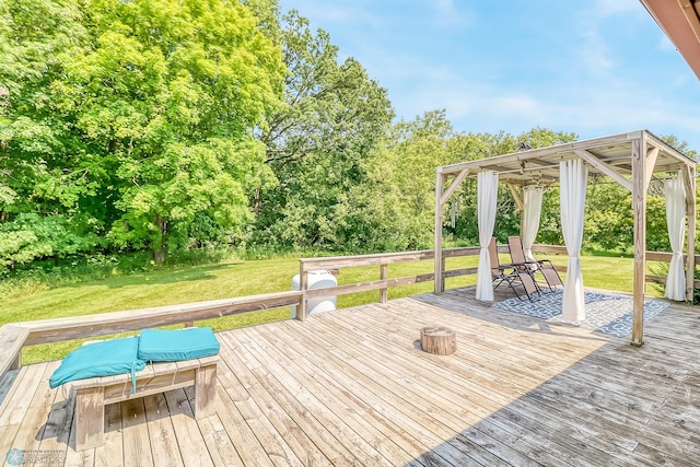 deck featuring a gazebo and a lawn