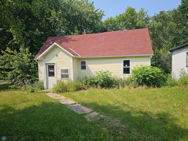 garage with a yard