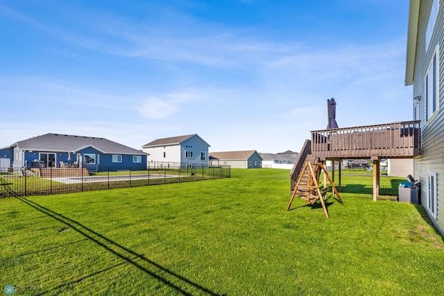 view of yard featuring a wooden deck