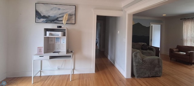 corridor featuring light hardwood / wood-style floors