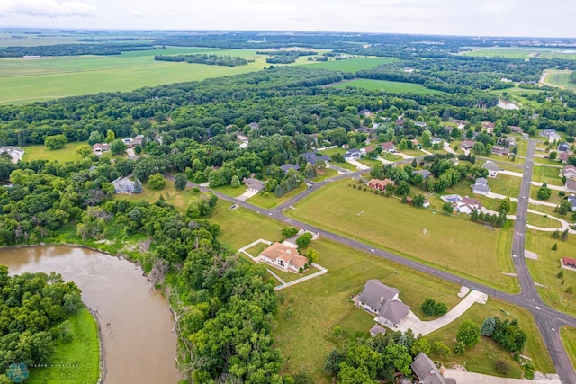 birds eye view of property with a water view and a rural view