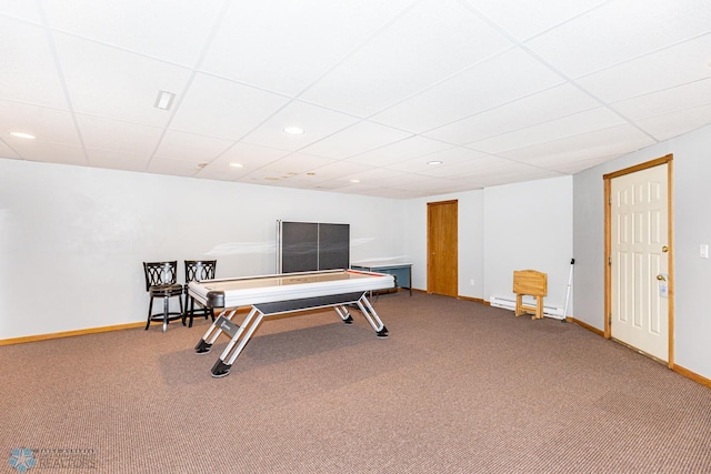 playroom with carpet and a paneled ceiling