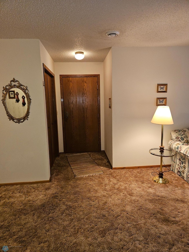 interior space featuring a textured ceiling