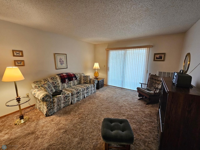 carpeted living room with a textured ceiling