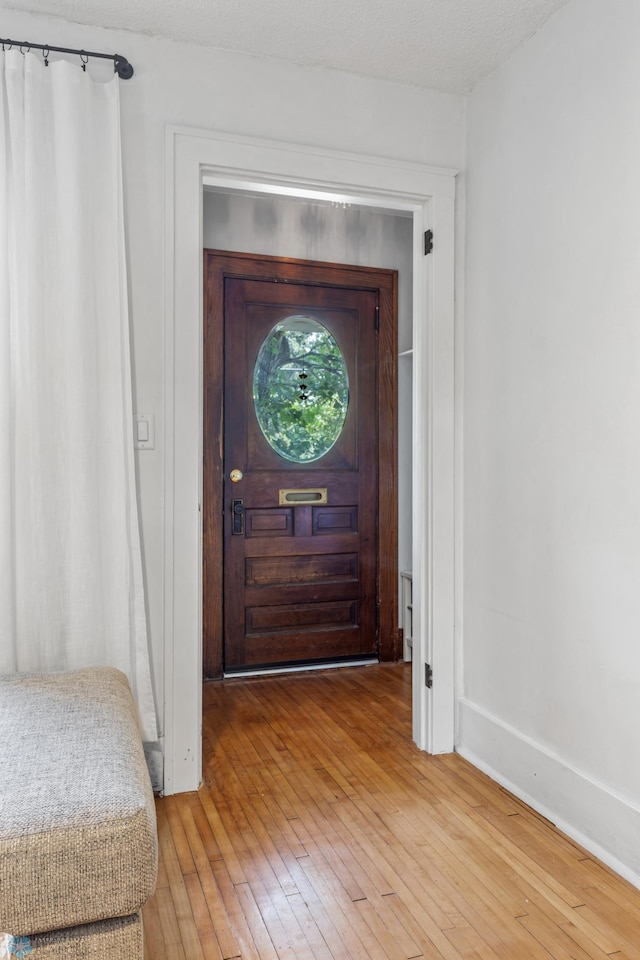 foyer featuring light wood-type flooring