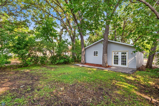 view of yard featuring french doors