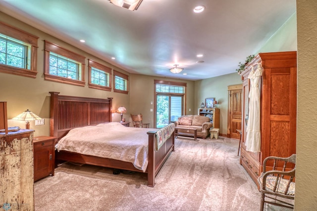 bedroom with light carpet