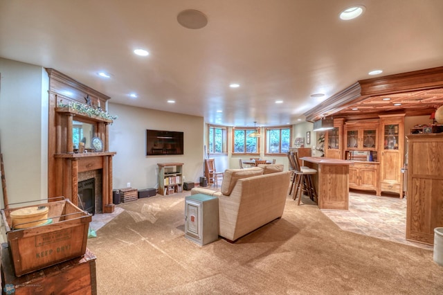 living room with light colored carpet and a premium fireplace