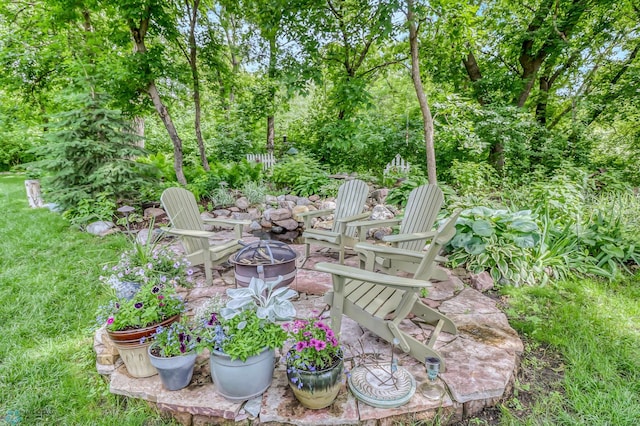 view of patio / terrace with an outdoor fire pit