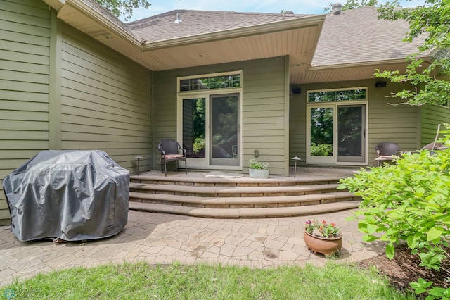 doorway to property featuring a patio