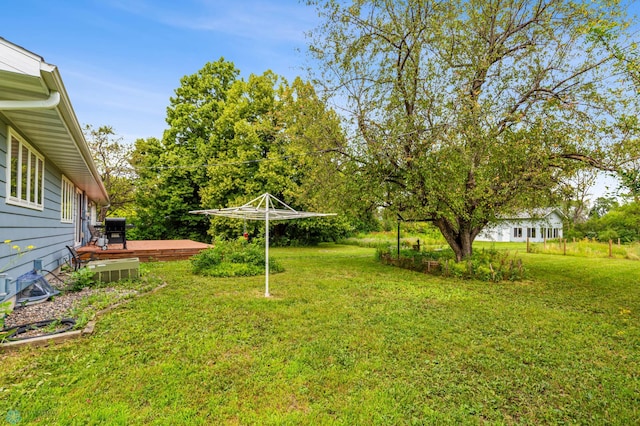 view of yard with a deck