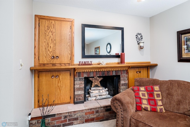 living room featuring a fireplace