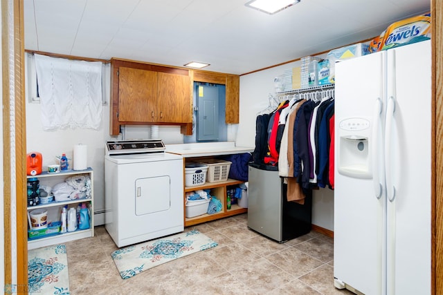 laundry room with washer / clothes dryer, light tile patterned floors, electric panel, and cabinets