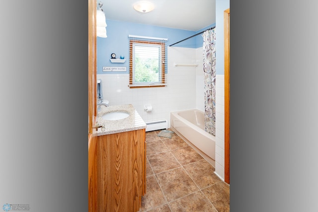 bathroom with vanity, tile walls, shower / bath combination with curtain, a baseboard radiator, and tile patterned flooring