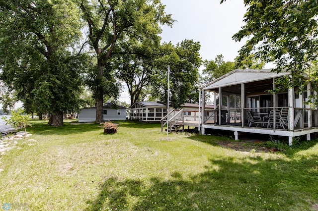 view of yard featuring a wooden deck