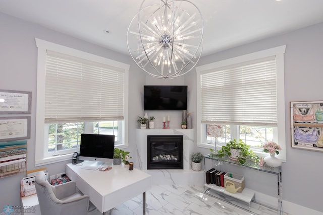 home office featuring tile patterned floors, an inviting chandelier, and plenty of natural light