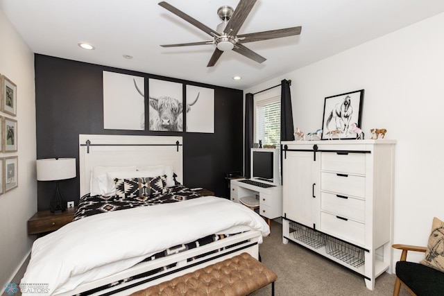 carpeted bedroom with ceiling fan