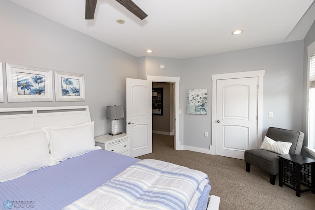 carpeted bedroom with ceiling fan