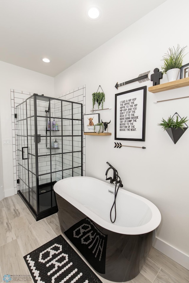 bathroom with independent shower and bath