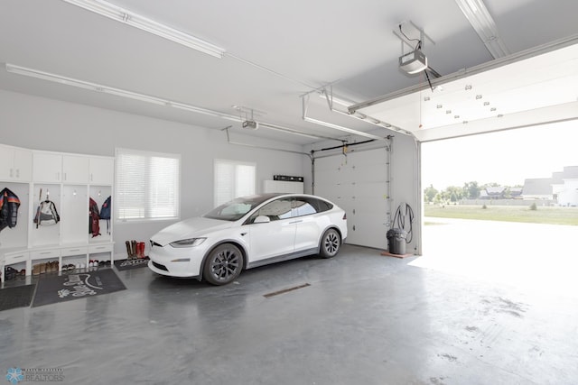 garage featuring a garage door opener