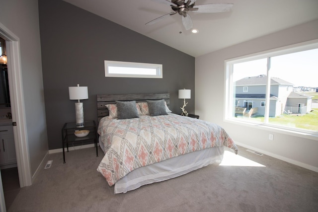 carpeted bedroom featuring lofted ceiling and ceiling fan