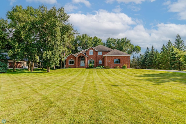 view of front facade featuring a front yard