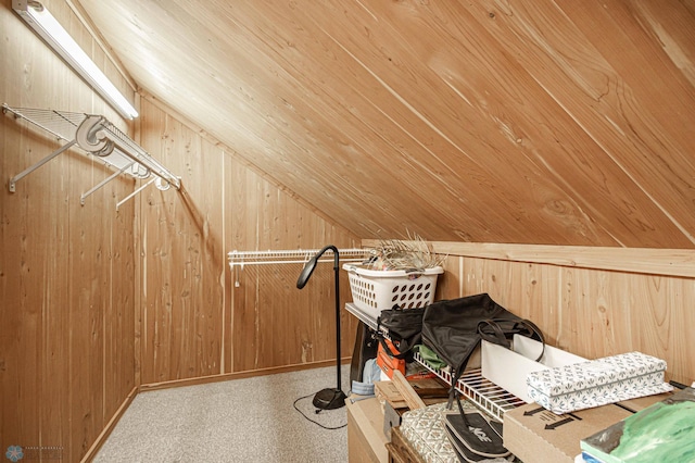 additional living space featuring wood ceiling, carpet, wooden walls, and vaulted ceiling