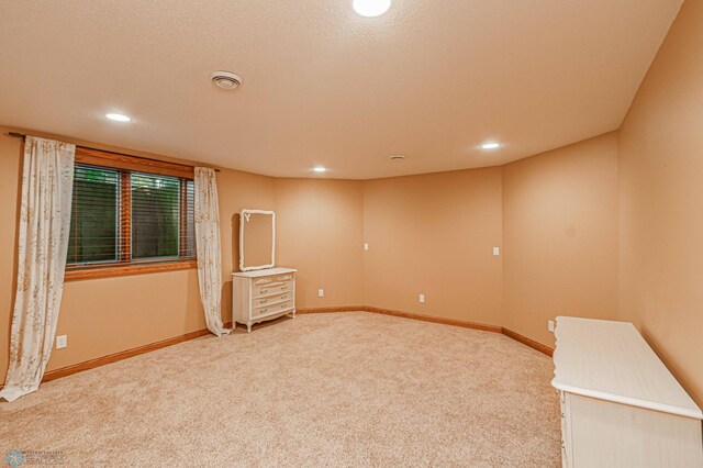 empty room featuring carpet flooring