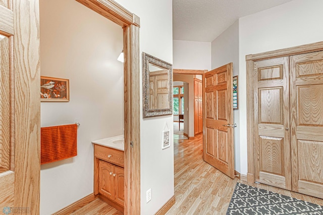 bathroom featuring vanity and hardwood / wood-style floors