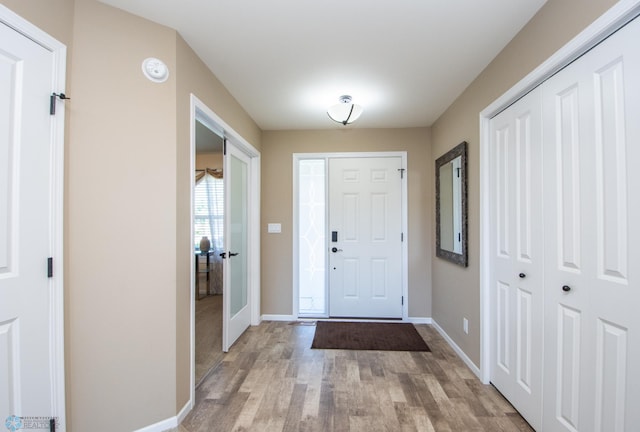 entryway featuring hardwood / wood-style flooring