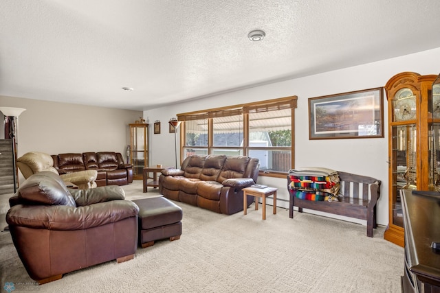 carpeted living room with a textured ceiling and a baseboard heating unit