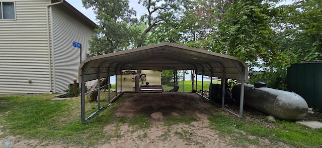 view of car parking with a carport and a lawn