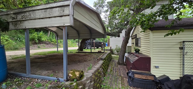 exterior space with a carport