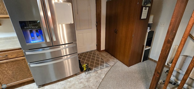 kitchen featuring stainless steel fridge