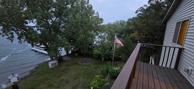 wooden deck with a water view