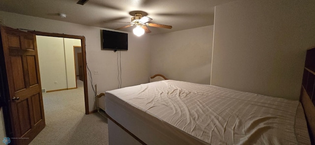 bedroom with ceiling fan and carpet flooring