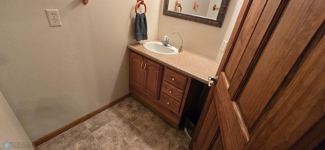 bathroom with vanity and tile patterned flooring